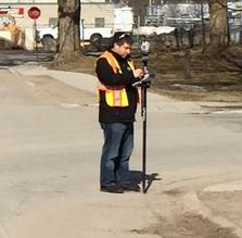 Image of Dean working as a land surveyor